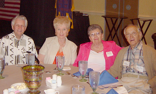 four members at a retirement party